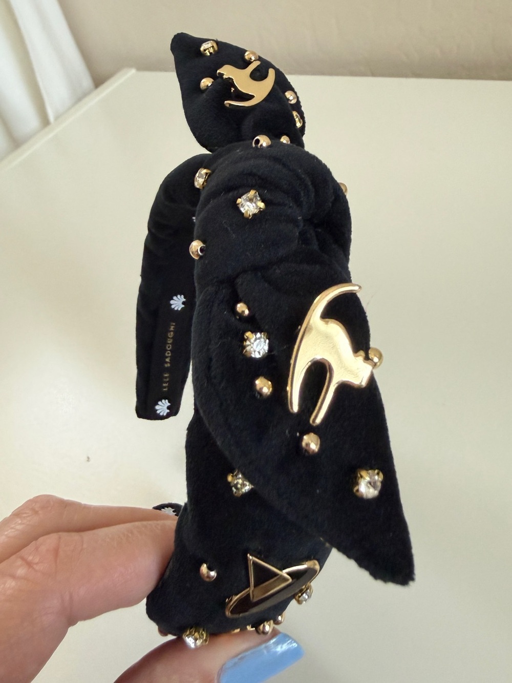Lele Sadoughi Kids Black Knotted Headband Gold Cat Charms Crystal Studs